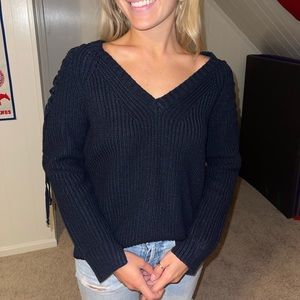 Navy knit sweater with lattice cutout on shoulders size M/L